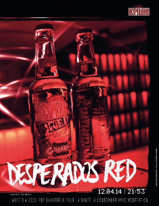 Publicité Desperados - Moments - 12/04/14 - 21h53 - Desperados Red - Photo de deux bouteilles qui se reflètent sur un bar, tons rouge - Agence Dufresne Corrigan Scarlett - Photo Ben Stockley - 2014