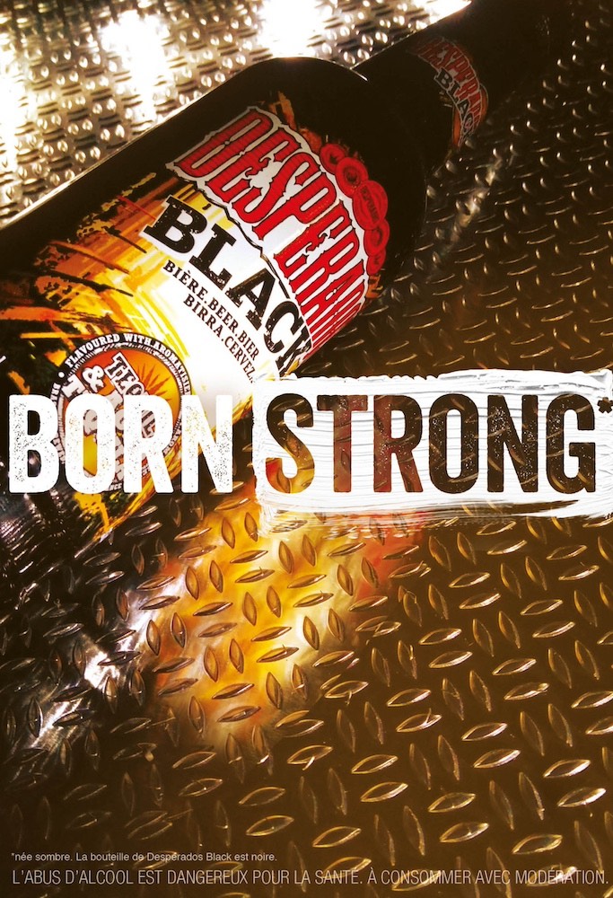 Publicité Desperados - Born strong-  Black - Bouteille posée sur un marchepied en métal - Agence Service Plan - France - 2017