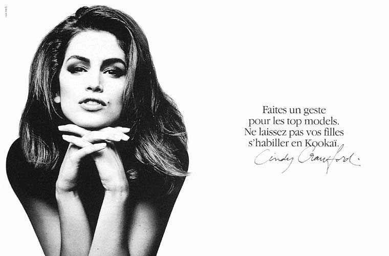 Publicité Kookaï - Noir et blanc - 1992 - Cindy Crawford - Faites un geste pour les top-models. Ne laissez pas vos filles s'habiller en Kookaï