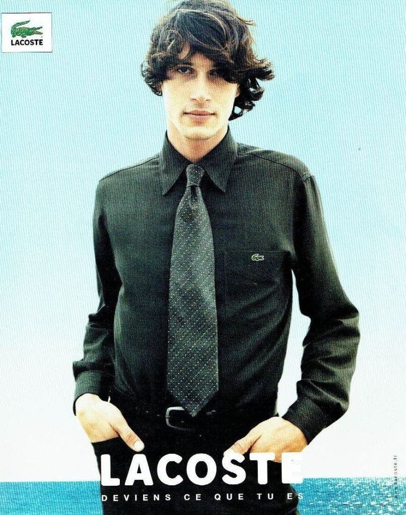 Publicité Lacoste - Deviens ce que tu es - Homme - Chemise noire - Agence Euro&RSCG Scher Lafarge - 2001
