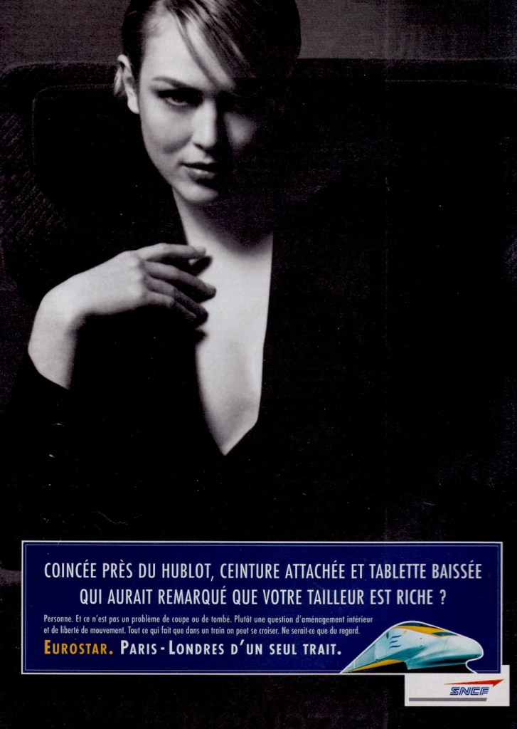 Publicité Eurostar - Agence Young&Rubicam - 1997-98 - Coincée près du hublot, ceinture attachée et tablette baissée qui aurait remarqué que votre tailleur est riche — Femme séduisante