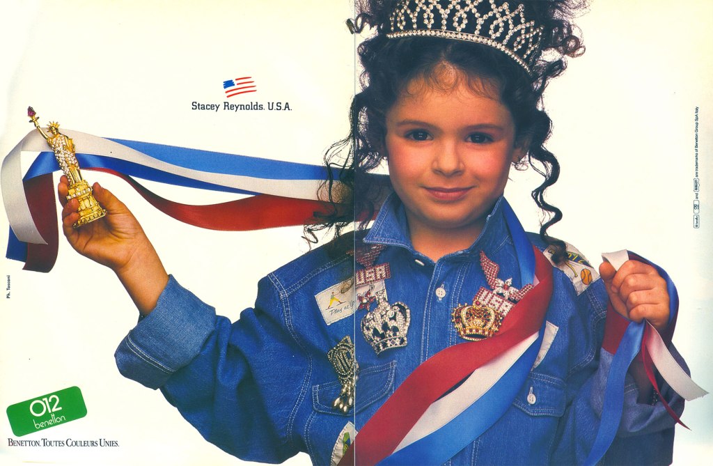 Publicité Benetton - United colors of Benetton - 0-12 - Jeune fille Stacey Reynolds (USA) avec diadème - 1987 - Oliviero Toscani