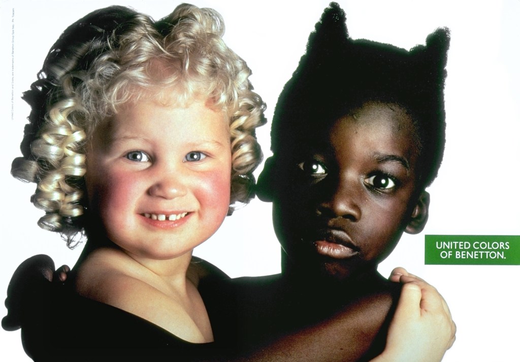 Publicité Benetton - United colors of Benetton — Oliviero Toscani - Enfant blanc (ange) et enfant noir (diablotin) - 1991