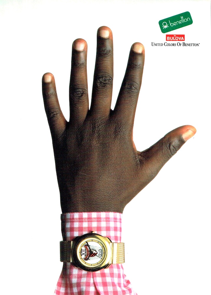 Publicité Benetton - Montre - Bulova - Main noir avec chemise à carreaux Vichy et montre au poignet - Oliviero Toscani - 1989