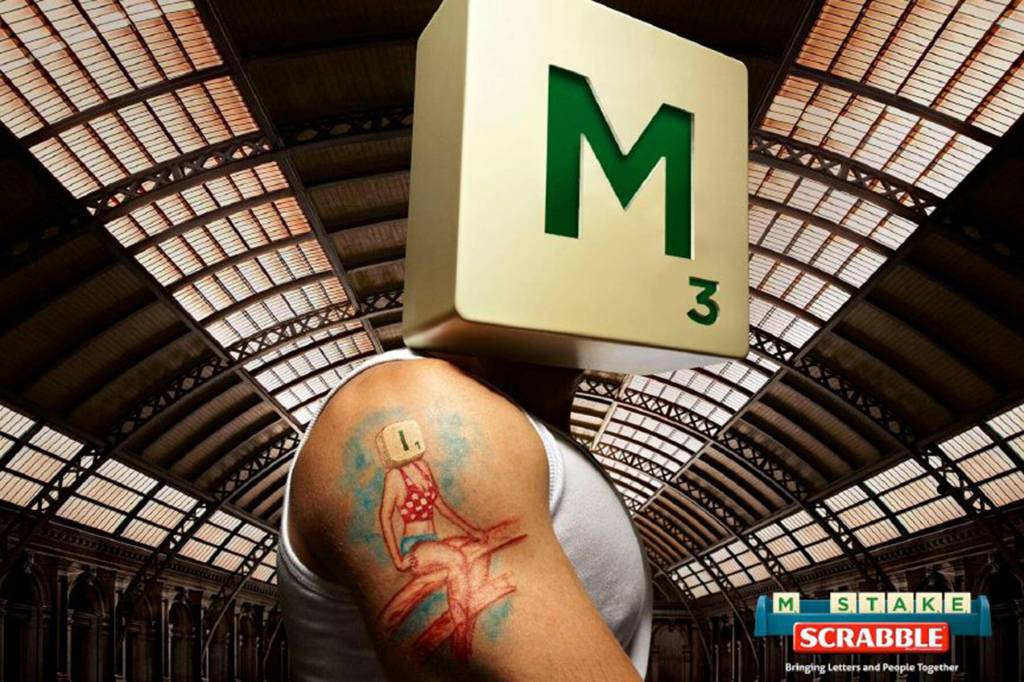 Publicité Scrabble - Letters and people - Agence Pereira & O’Dell - USA - 2013 - Homme M avec une femme  I tatouée sur le bras - Mistake