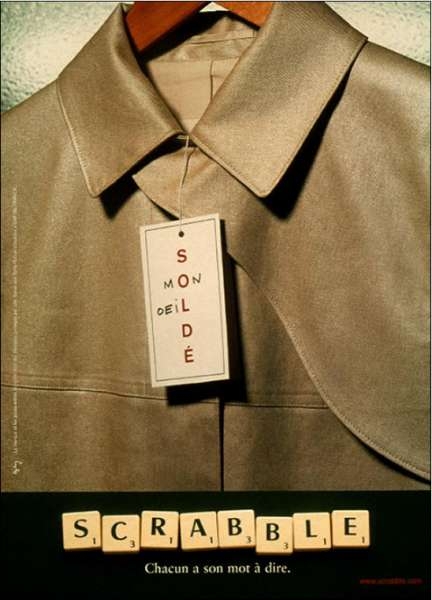 Publiicité Scrabble - Chacun a son mot à dire - Agence Ogilvy - 2001 - Solde - Mon oeil - Veste sur un cintre avec un panneau solde