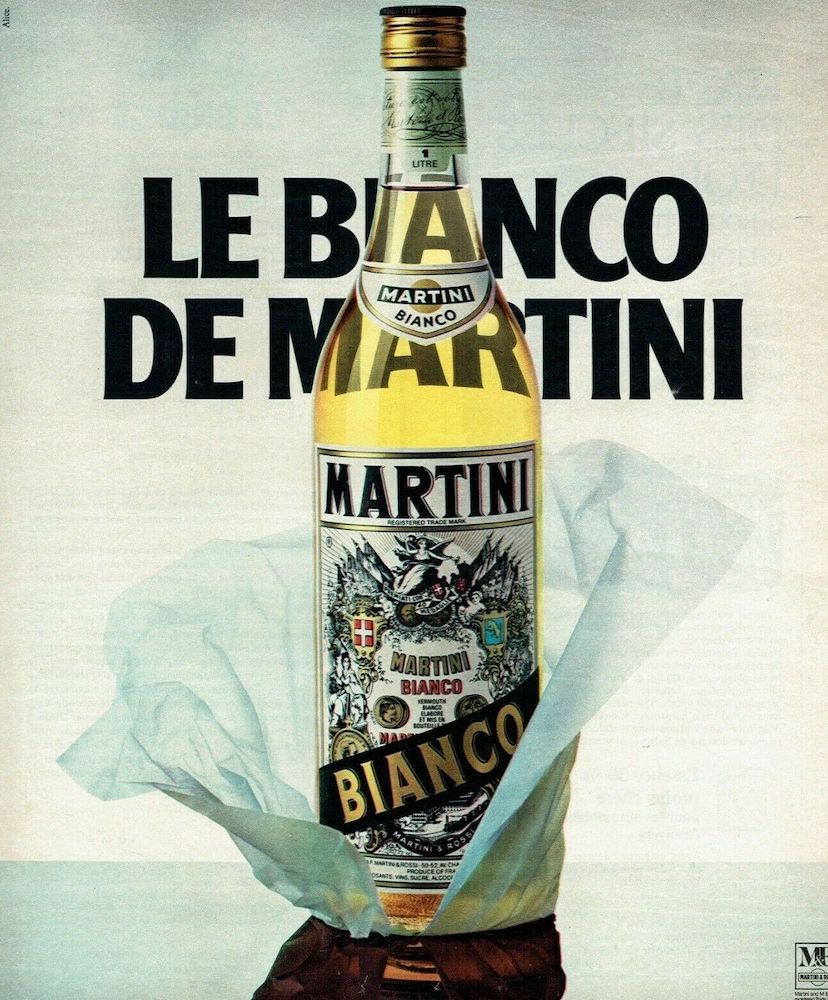 Publicité Martini - Bouteille de Martini Bianco empaquetée dans un papier fin - Le bianco de Martini - 1977
