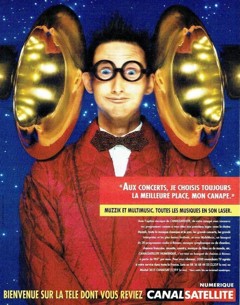 Publicité Canal Satellite - Aux concerts, je choisis toujours la meilleure place - Homme la tête entre 2 tubas - Muzzic et multimusic