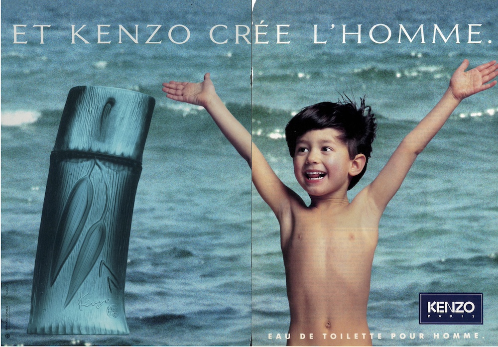 Publicité Kenzo - Kenzo Homme - Et Kenzo crée l'homme - Enfant bras écartés devant la mer à côté du produit - Agence Publicis - Double page