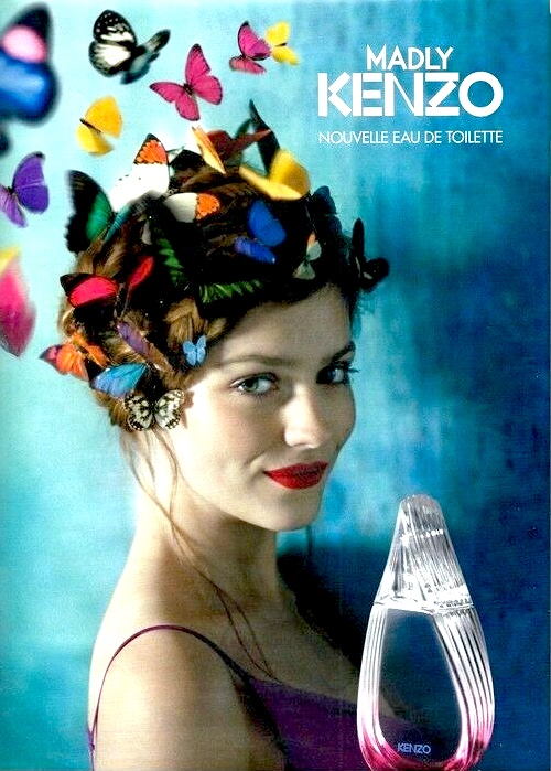 Publicité Kenzo - Parfum Madly - Femme avec papillons en guise de coiffe - 2012