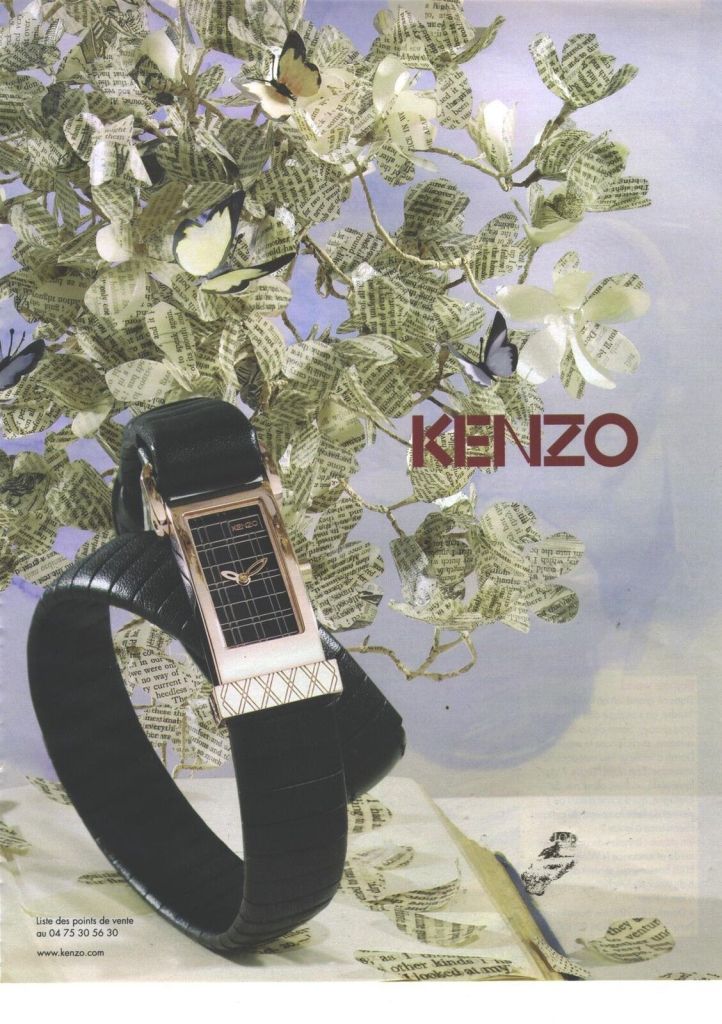 Publicité Kenzo - Montres - Montre entourée de fleurs en papier - 2008