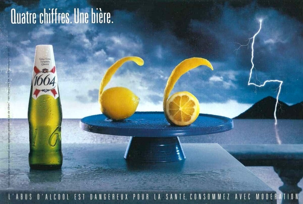 Campagne 1664 - Quatre chiffres. Une bière - Décor surréaliste - 1664 formé par la bouteille, 2 citrons et un éclair - Agence Young&Rubicam - France - 2002 