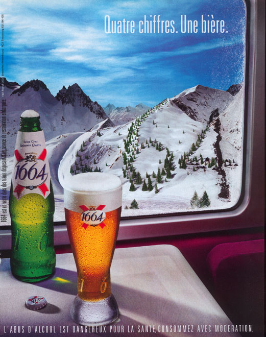 Campagne 1664 - Quatre chiffres. Une bière - Montagnes - 1664 formé par la bouteille, 1 piste de ski et la mousse du verre, des sapins sur la neige - Agence Young & Rubicam - 2023