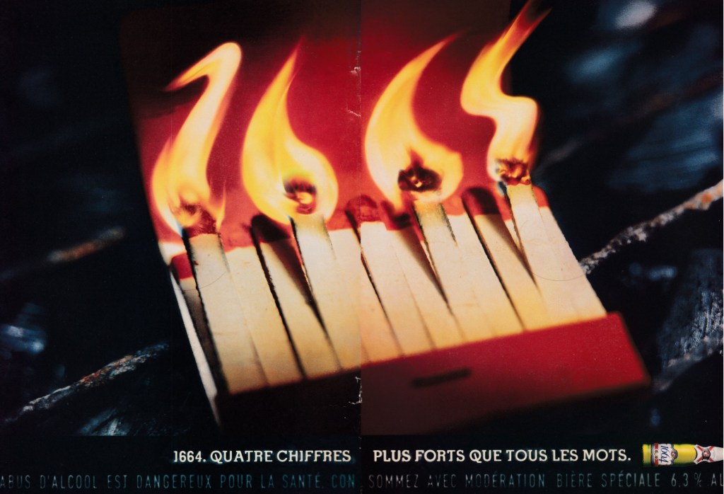 Publicité 1664 - Quatre chiffres plus forts que tous les mots - Les flammes de la pochette d'allumettes forment le nombre 1664 -  Agence BDDP - France - 1997