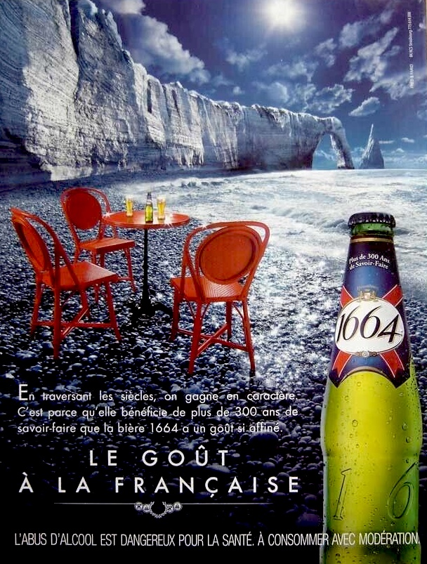 Publicité 1664- Le goût à la française - Falaise d'Etretat - Chaises et table rouge - Agence Fred&Farid - 2009-2010