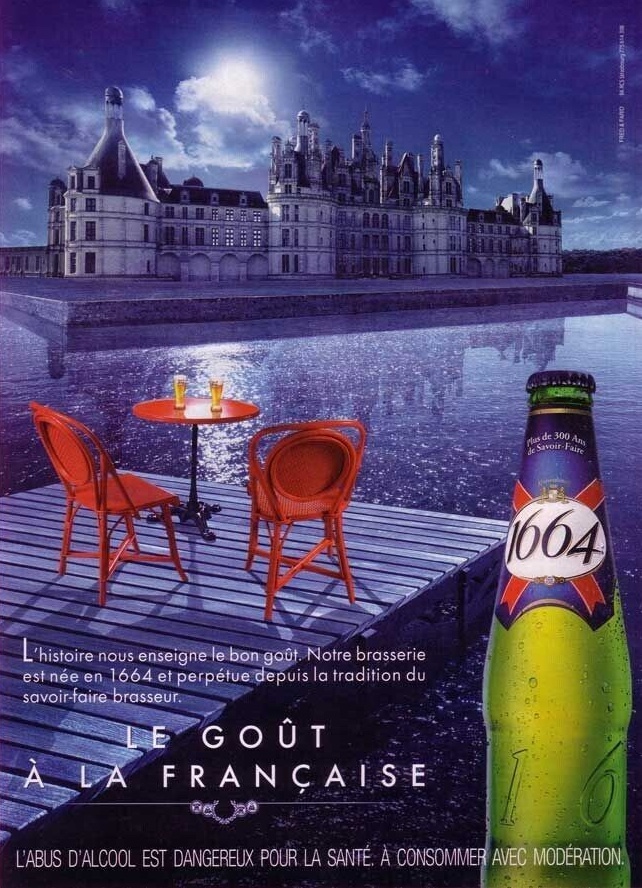 Publicité 1664- Le goût à la française - Château de Chambord - Chaises et table rouge - Agence Fred&Farid - 2009-2010