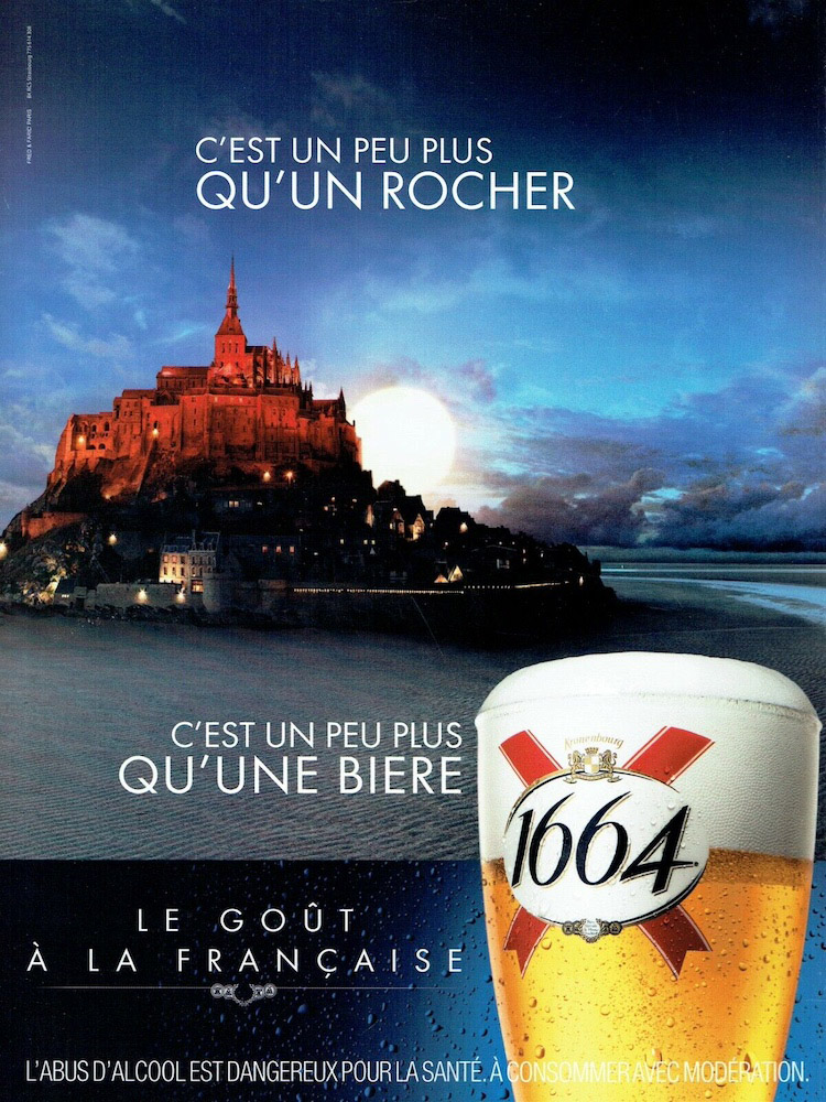 Publicité 1664- Le goût à la française - C'est un peu plus qu'un rocher - Mont Saint Michel rouge -  Agence Fred&Farid - 2009-2010