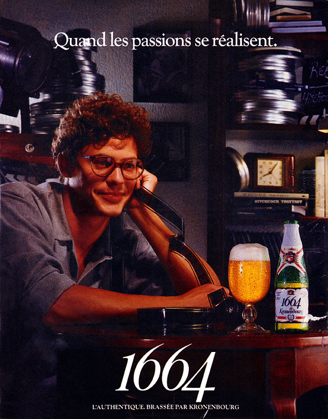 Publicité 1664 - Quand les passions se réalisent - Un homme tient une pellicule - 1985