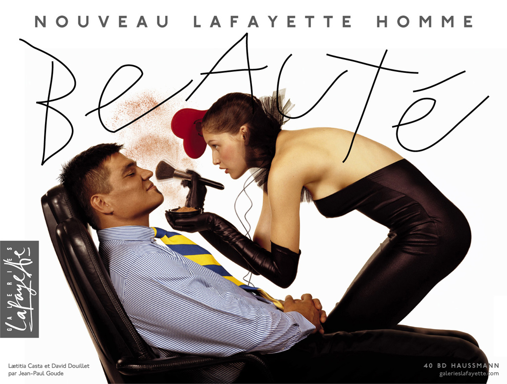 Publicité Galeries Lafayette - L'homme - Beauté - Laetitia Casta maquille David Douillet - Coeur - Agence Aubert Storch associés - Jean Paul Goude