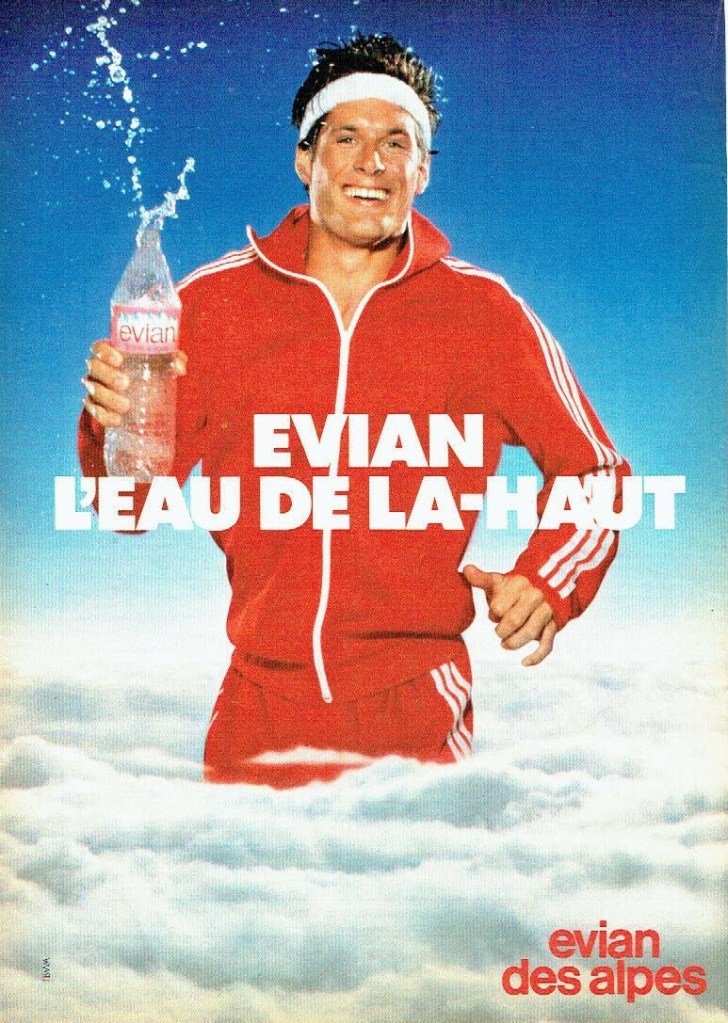 Publicité evian - L'eau de là-haut - Un homme en survêtement rouge émerge des nuages - Agence Bélier - 1980