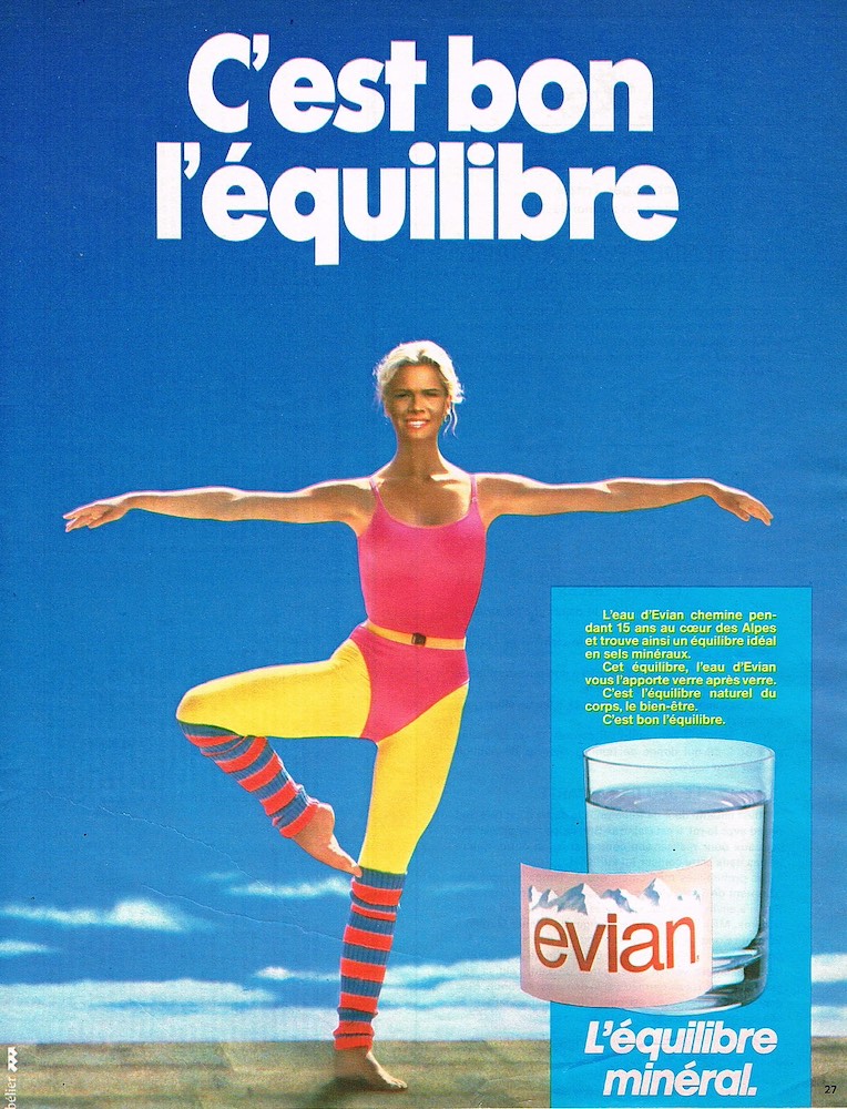 Publicité evian - C'est bon l'équilibre - Une femme blonde en body de sport rose se tient sur un pied les bras écartés - Agence Bélier - 1983-84