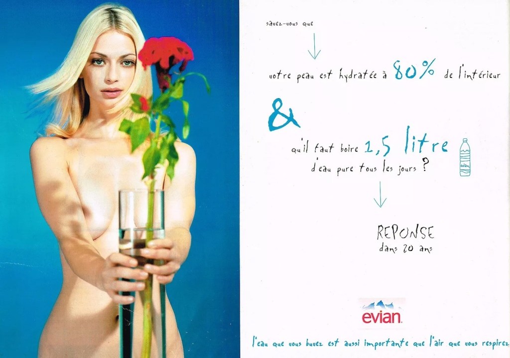 Publicité evian - L'eau que vous buvez est aussi importante que l'air que vous respirez - Femme nue tient un vase avec une rose - Agence BETC EuroRSCG Paris - 1996