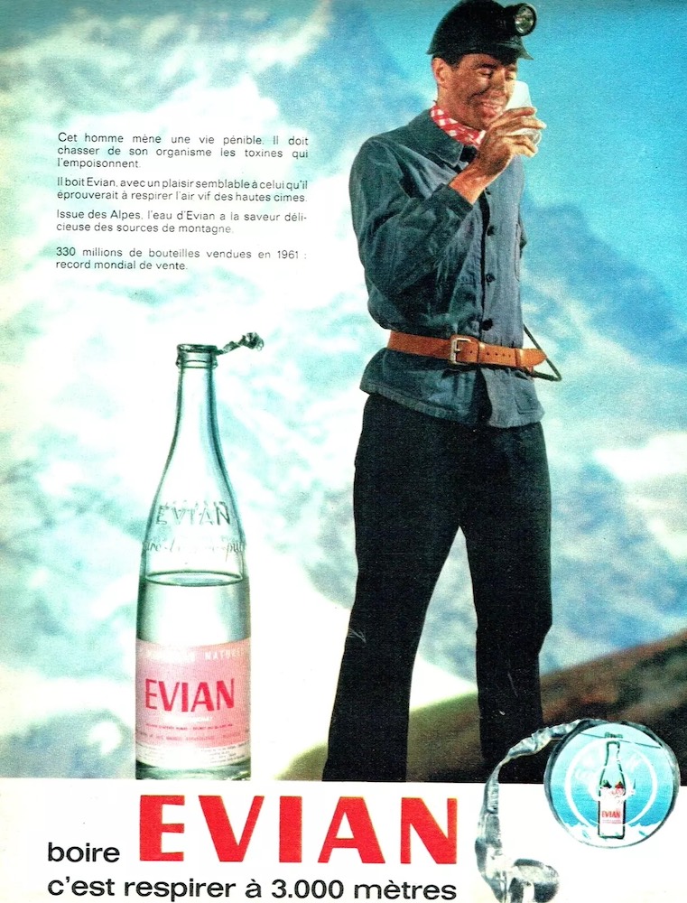Publicité EVIAN - Boire EVIAN, c'est respirer à 3000 mètres - Un mineur en train de boire dans un décor alpestre - 1962