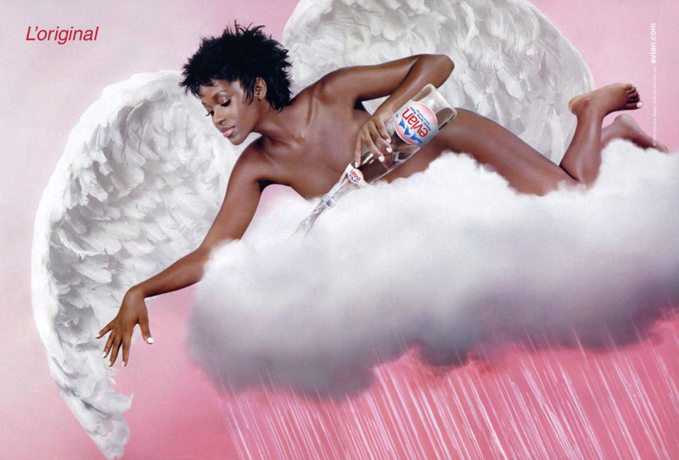 Publicité evian - L'original - UK/US - Un ange avec une bouteille d'evian à la main sur un nuage fait tomber la pluie - EuroRSCG Londres - 1999