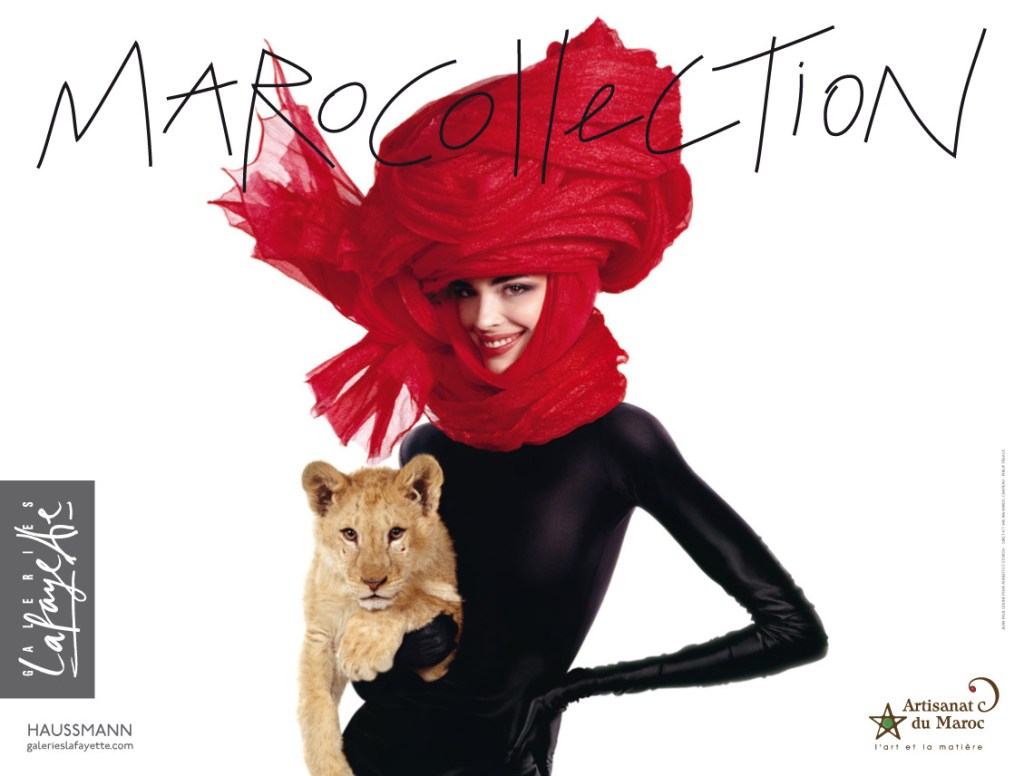 Publicité Galeries Lafayette - Marocollection - Femme avec un turban rouge tient un lionceau dans ses bras - Agence Aubert Storch associés - Jean Paul Goude