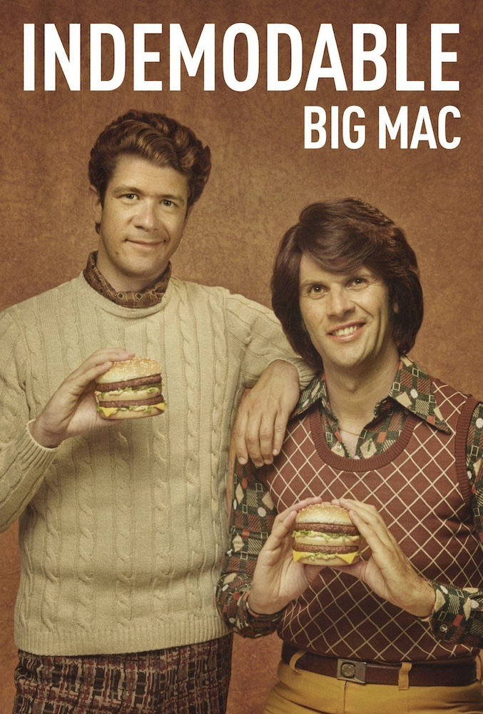 Publicité McDonald's - 50 ans Big Mac - Années 70 - Deux hommes avec un look pull chemises ont un Big Mac entre les mains - Agence TBWA Paris - 2018